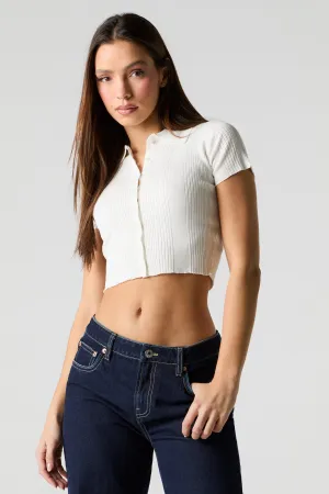 Polo boutonné en tricot côtelé