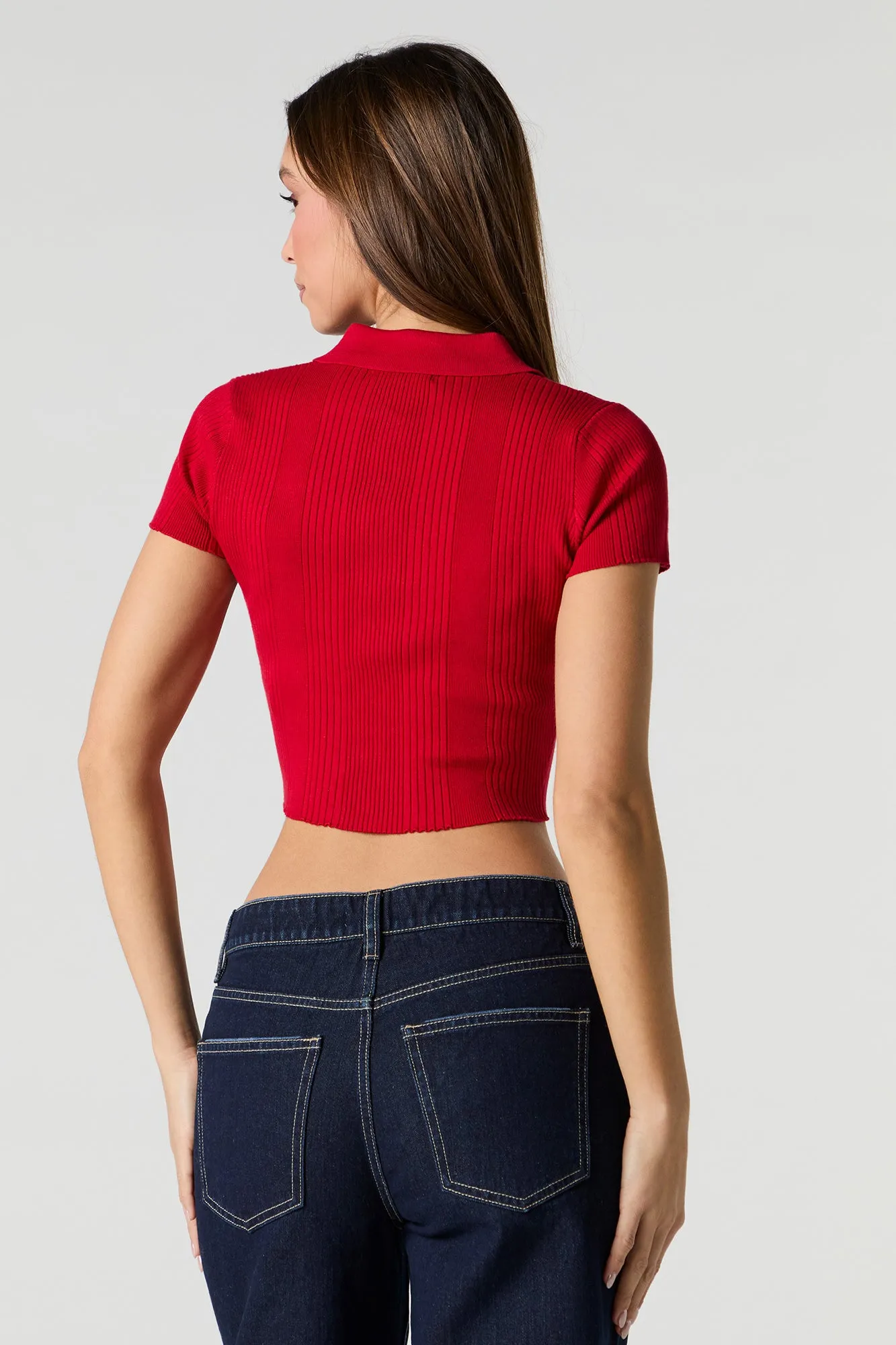 Polo boutonné en tricot côtelé