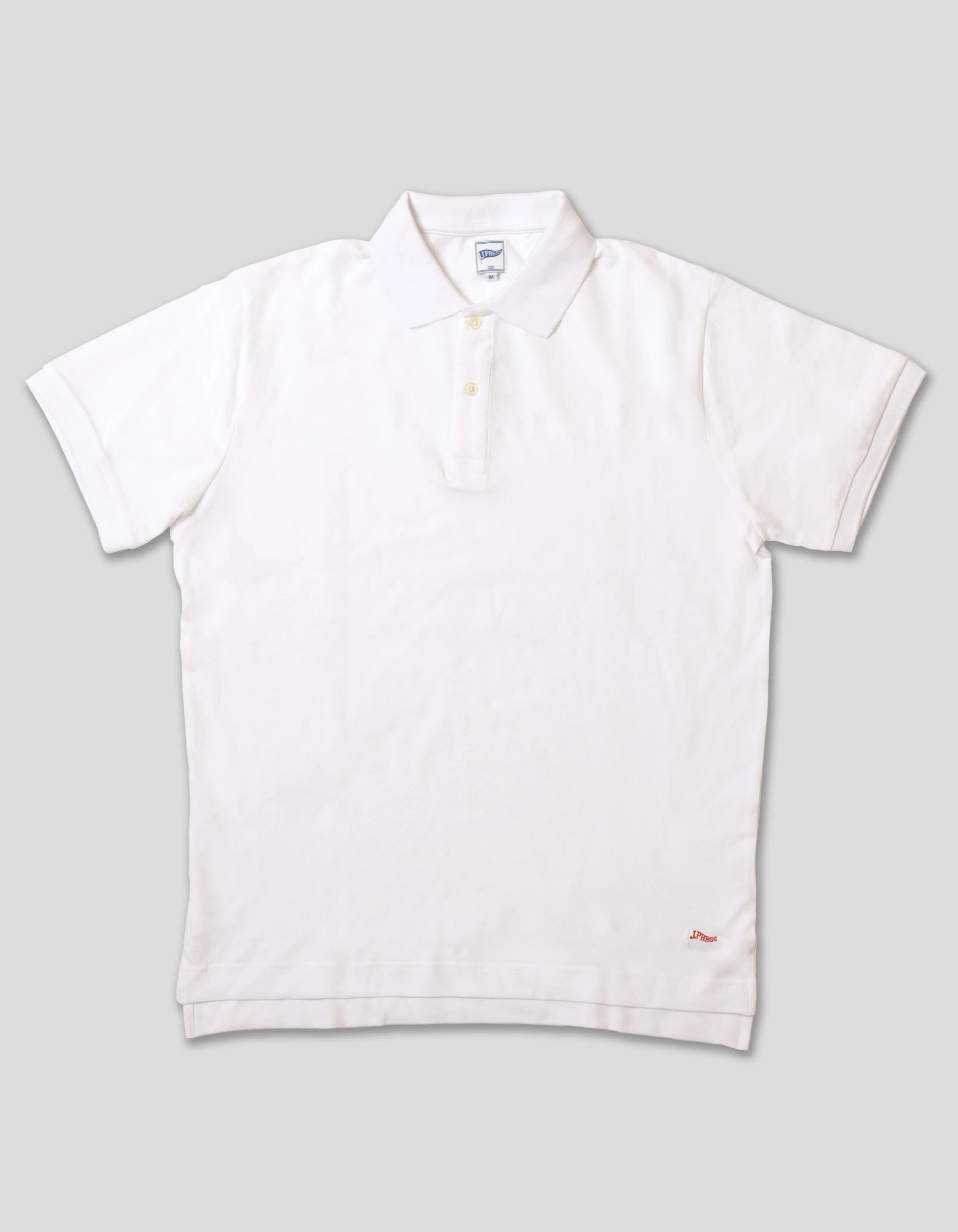 WHITE PIQUE PENNANT POLO